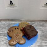 An assortment of The Village Bakery's Cookies -- Gingerbread man, Snickerdoodle, chocolate chip, and a brownie