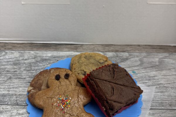 An assortment of The Village Bakery's Cookies -- Gingerbread man, Snickerdoodle, chocolate chip, and a brownie